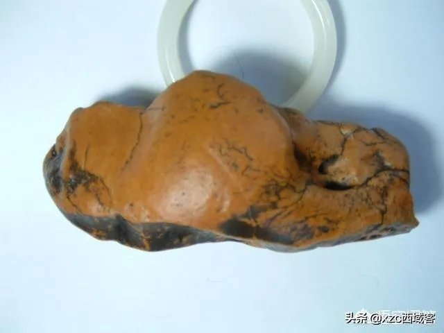 怎样挑选新疆和田玉把件？