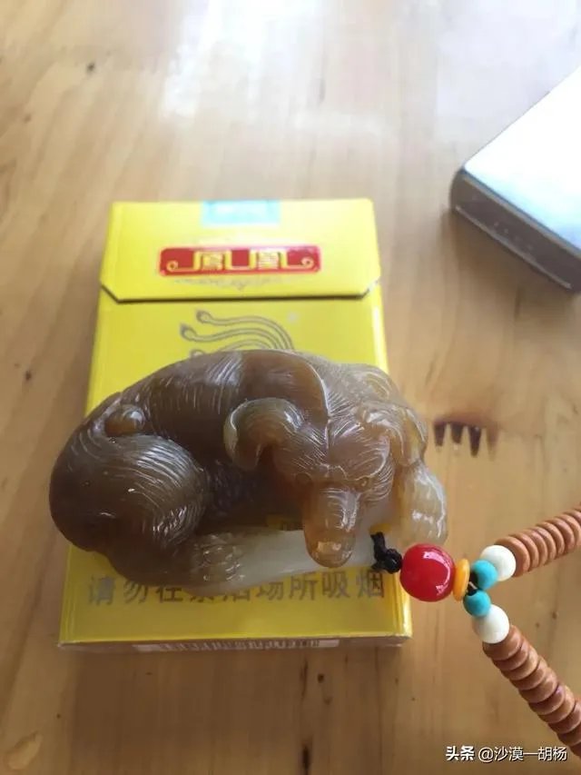 怎样挑选新疆和田玉把件？