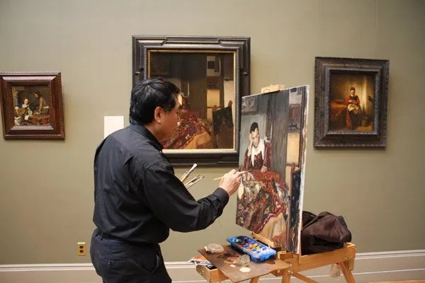 静物前的姑娘杨飞云