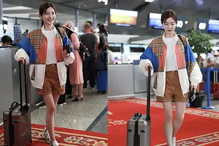 江疏影叮嘱粉丝网友感动 机场现身穿格子夹克很时尚