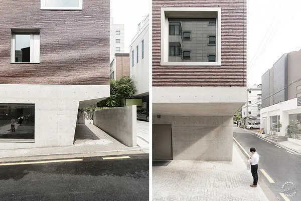 砖和混凝土建造的头重脚轻的办公楼和公寓