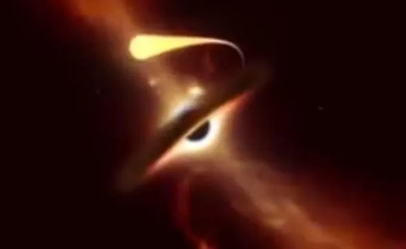 黑洞撕裂恒星瞬间 恒星濒死时发出闪光十分震撼